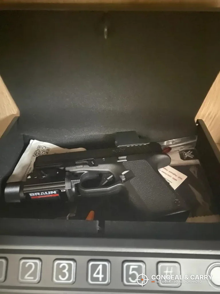 Compact pistol inside the AIRMuch biometric safe