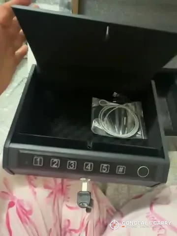 AIRMuch safe lid open on a bed