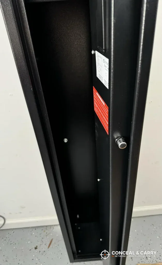 Barska rifle safe door open with a locking bolt standing out from the door edge