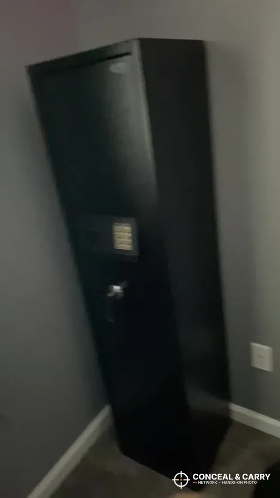 BBRKIN rifle safe standing closed in the corner of a room