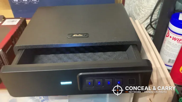 BBRKIN Slide-Away biometric safe with the drawer partway open, egg-crate foam and lit keypad