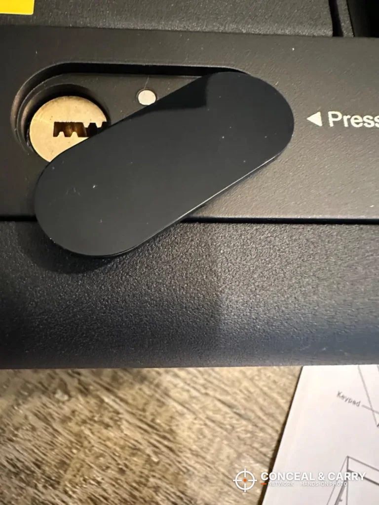 BE-TECH lock box key cover slid aside to show the keyhole