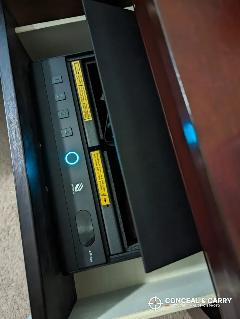BE-TECH lock box in a nightstand drawer with the reader lit blue