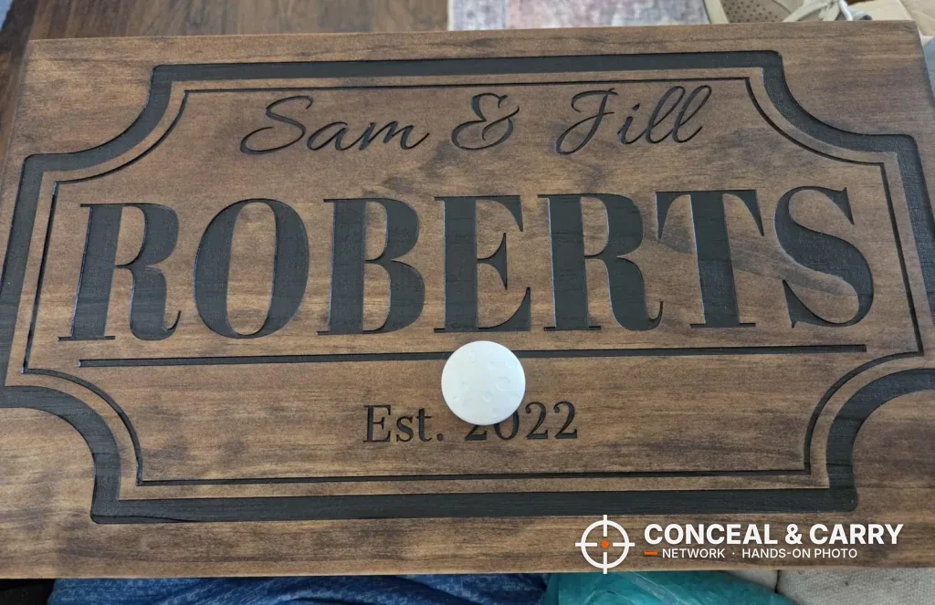 Bellewood hidden gun safe sign personalized for the Roberts family, Est. 2022