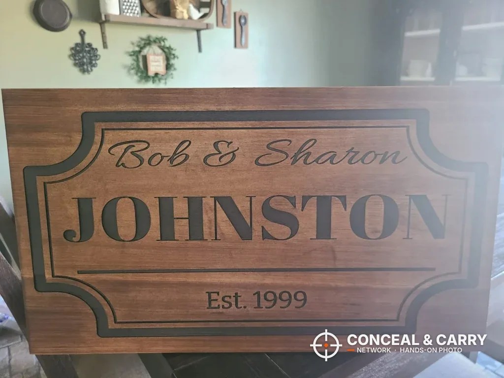 Bellewood hidden gun sign with the Johnston family name and Est. 1999