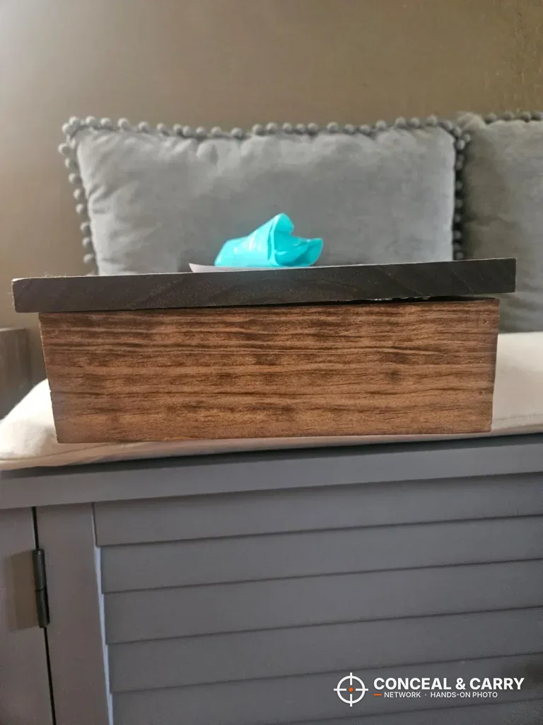 Bellewood hidden sign lying flat on a cabinet, seen from the edge