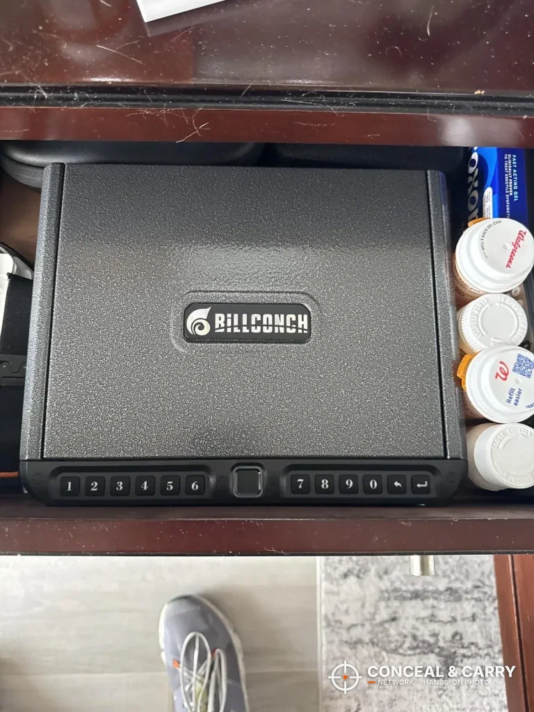 BILLCONCH biometric handgun safe closed inside a nightstand drawer