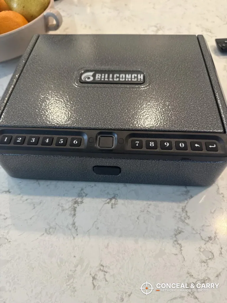 BILLCONCH handgun safe front with the fingerprint reader in the middle of the keypad row