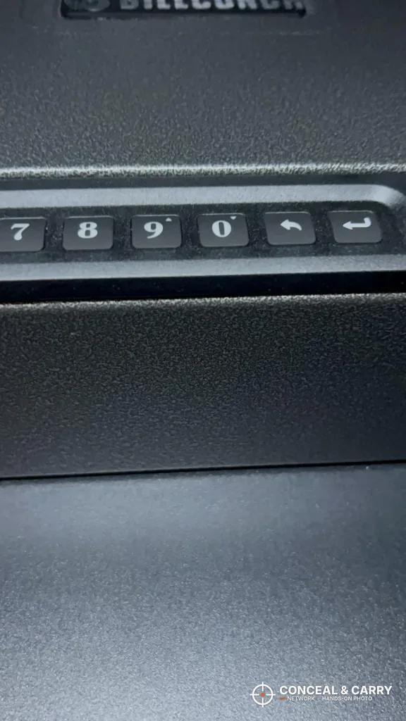 Close-up of the BILLCONCH safe keypad buttons 7, 8, 9, 0, back and enter