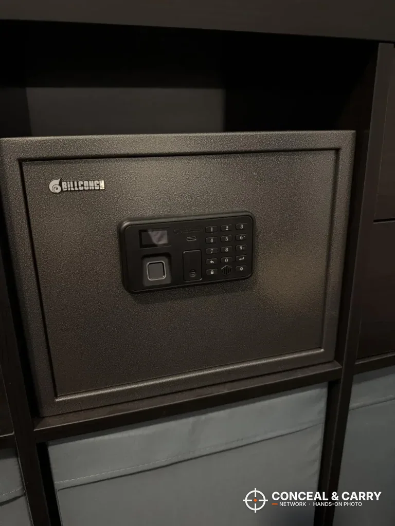 Billconch multi-pistol smart safe sitting in a cube shelf unit