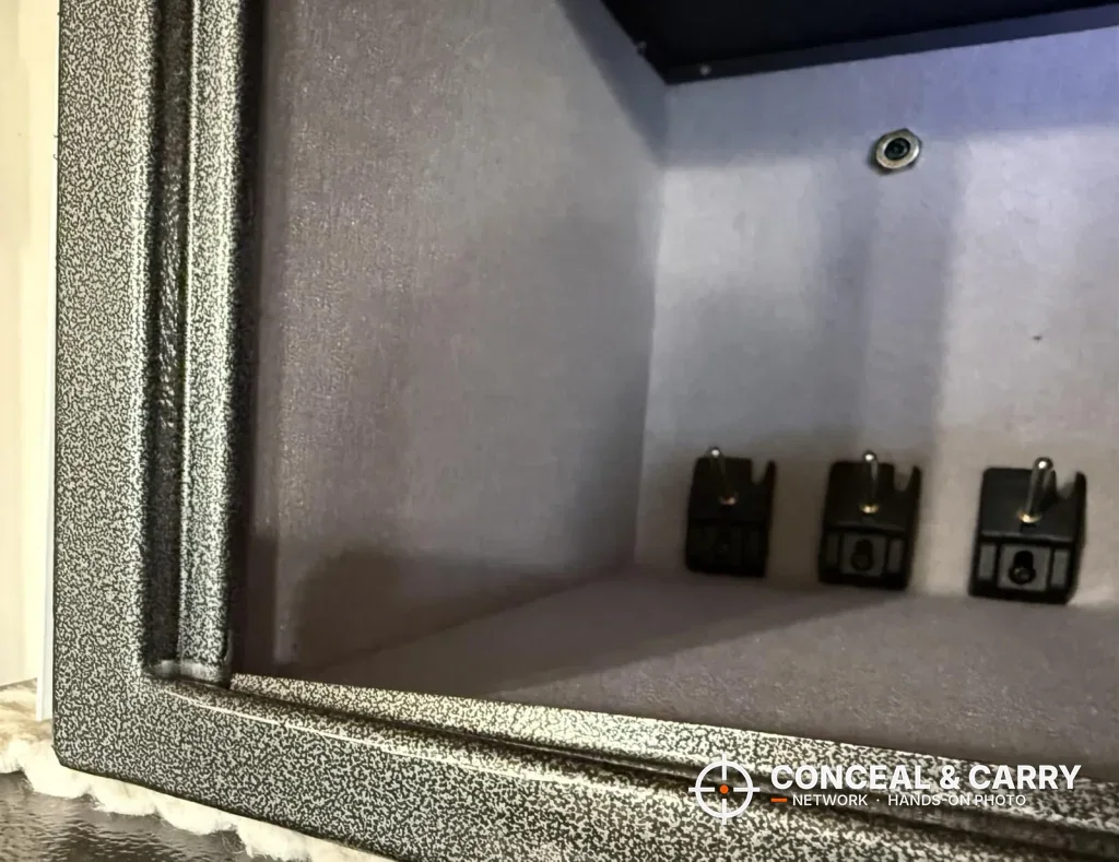 Close-up of the pistol bracket posts on the floor of the Billconch safe