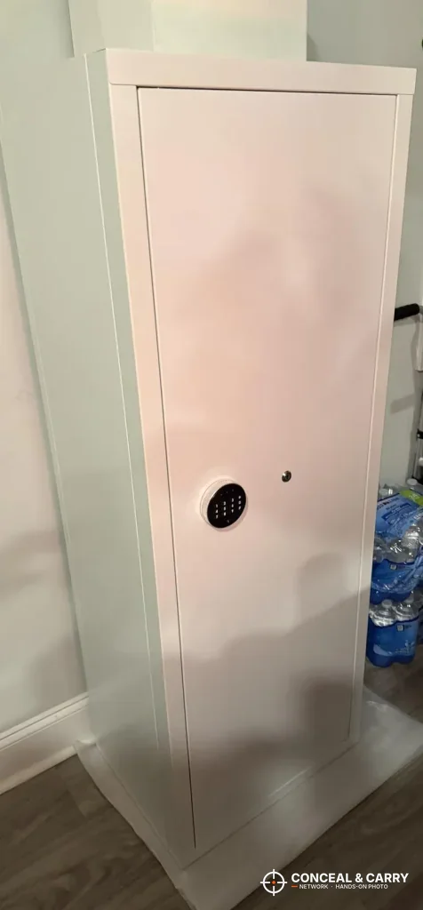 White Bonusall 12-15 gun rifle safe standing closed against a wall