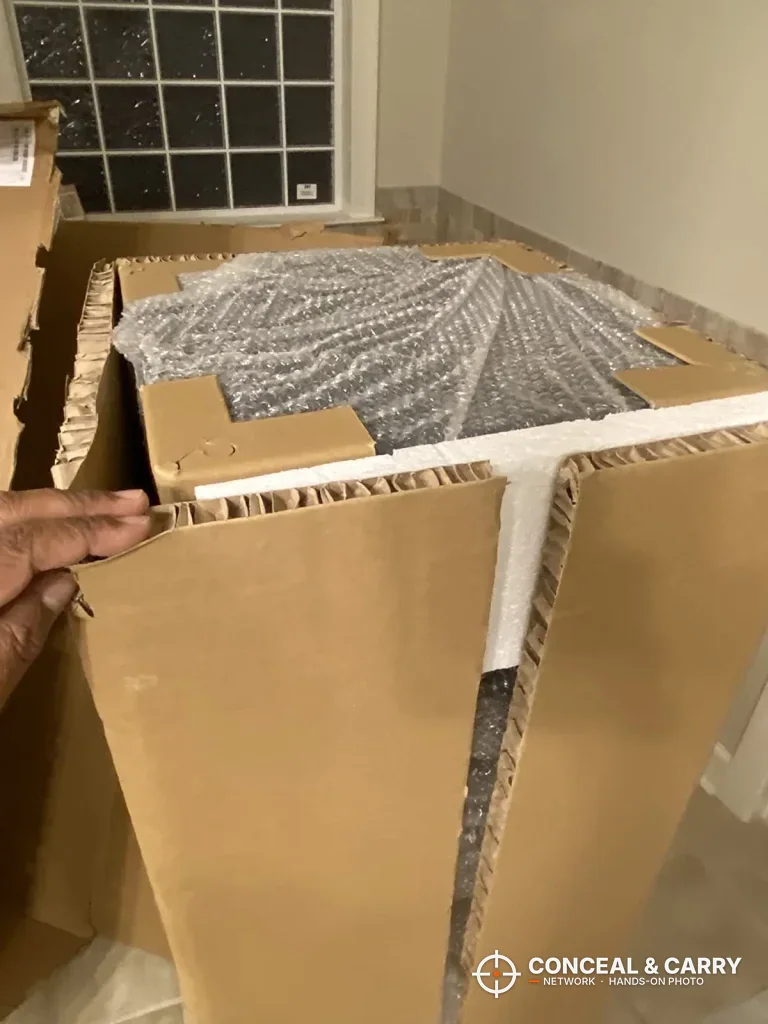 Bonusall rifle safe carton opened with bubble wrap and honeycomb cardboard packing