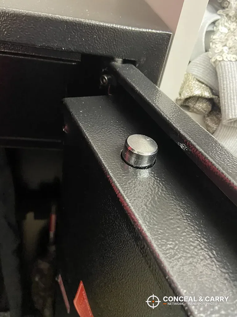 Textured black finish and round chrome fitting on the Bonusall safe door