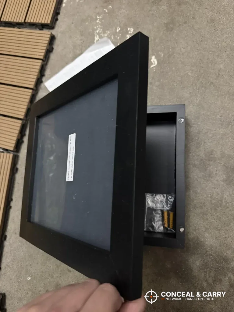 Dononr frame swung open with the hardware bag still in the compartment