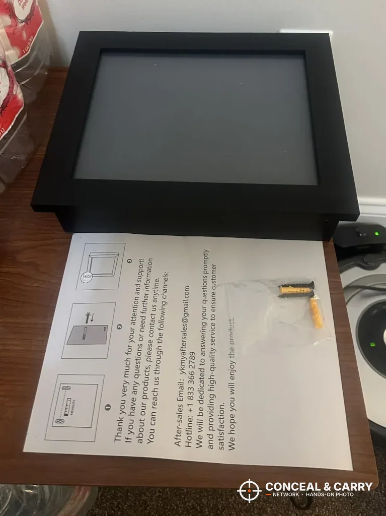 Dononr frame with its instruction sheet and bag of wall anchors