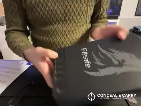 Fitsafe biometric safe held in both hands