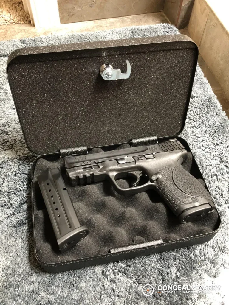 Striker-fired pistol and magazine inside the open FSDC MLC5200