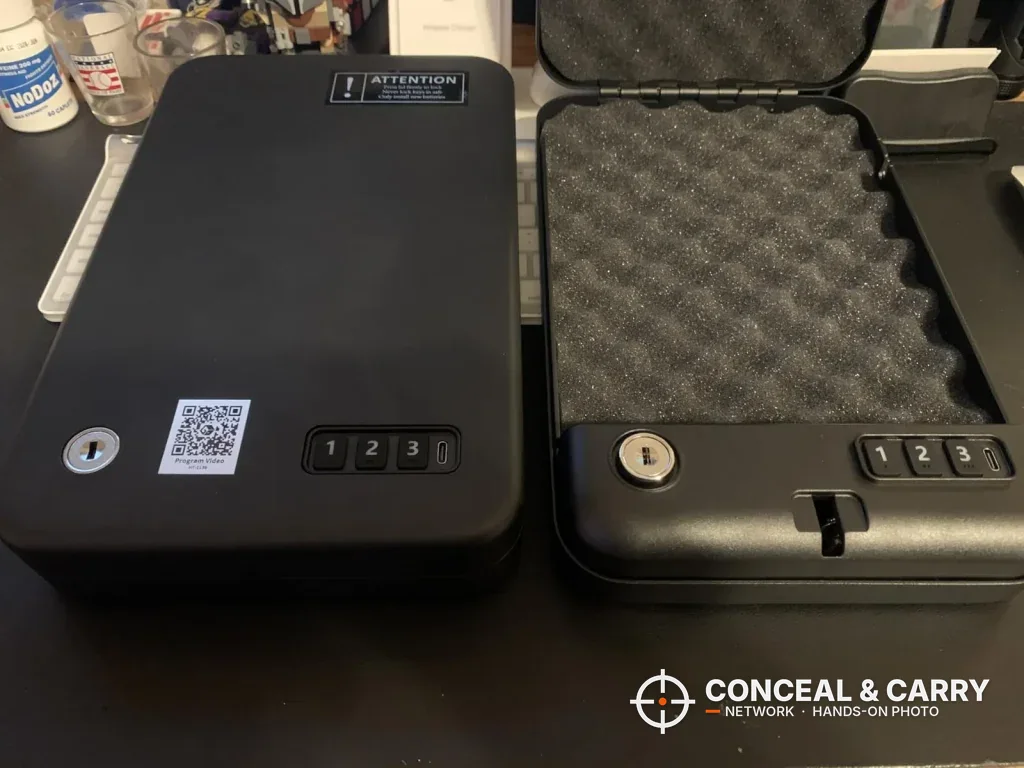 Two Grimtron car gun safes side by side, one closed and one open showing the foam