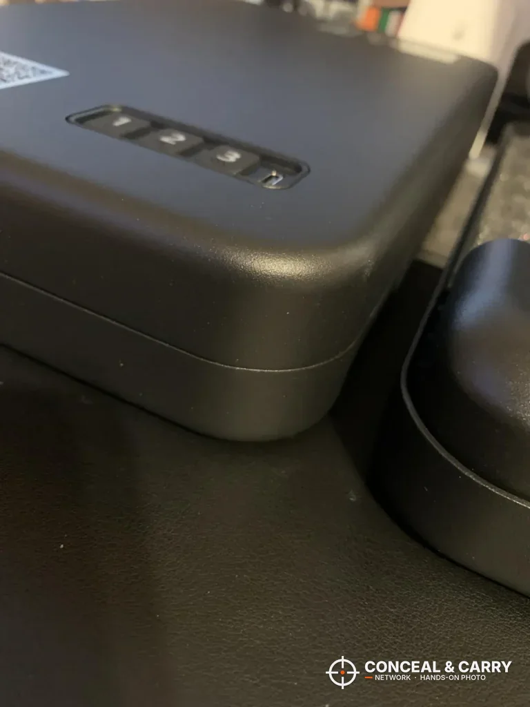 Close-up of the numbered buttons on the Grimtron car gun safe