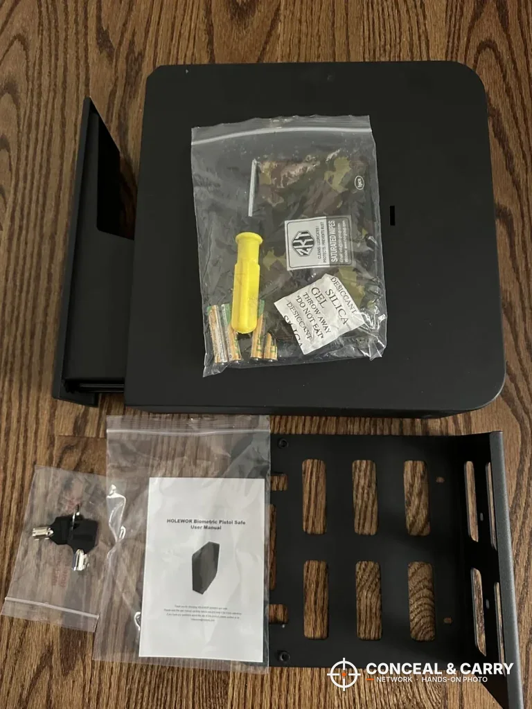 HOLEWOR slider safe unboxed with the bracket, hardware bag and instructions