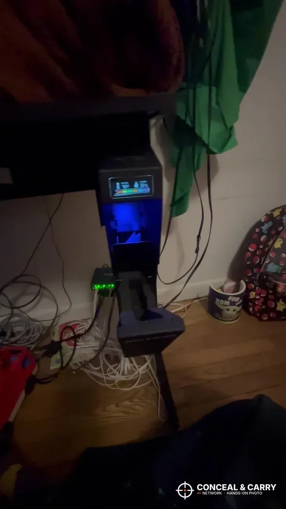 HOLEWOR drop-down safe display glowing in a dark room