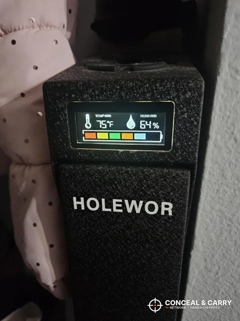 HOLEWOR drop-down safe LCD showing temperature, humidity and battery level