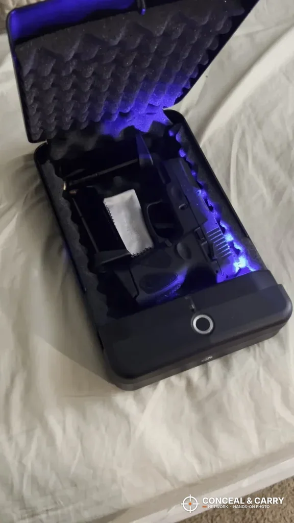 HOLEWOR lock box open with the blue interior light on