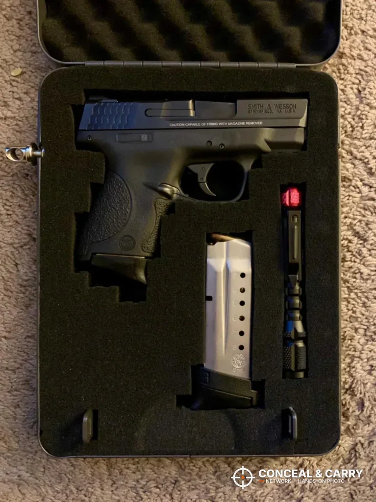 Pistol and spare magazine set in a cut-foam insert inside the Hornady Lockbox