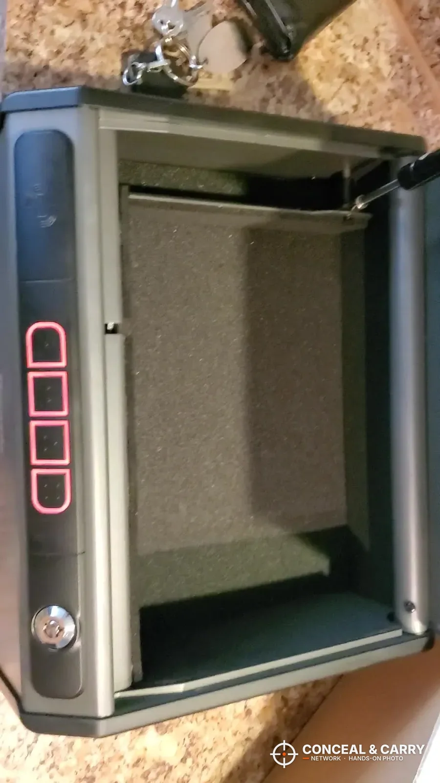Hornady RAPiD Keypad Vault open with lit keypad buttons and the key lock along the front edge