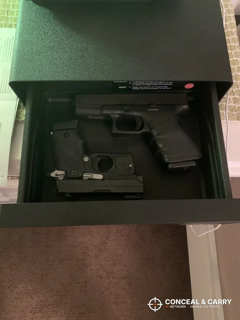 Hornady Night Guard drawer open with a pistol and holster inside