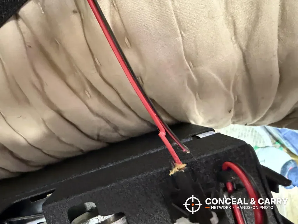 Red and black wire inside the Hornady Night Guard housing