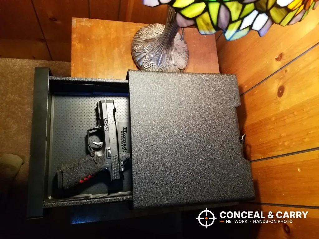 Hornady Night Guard drawer slid open with a pistol inside, seen from above