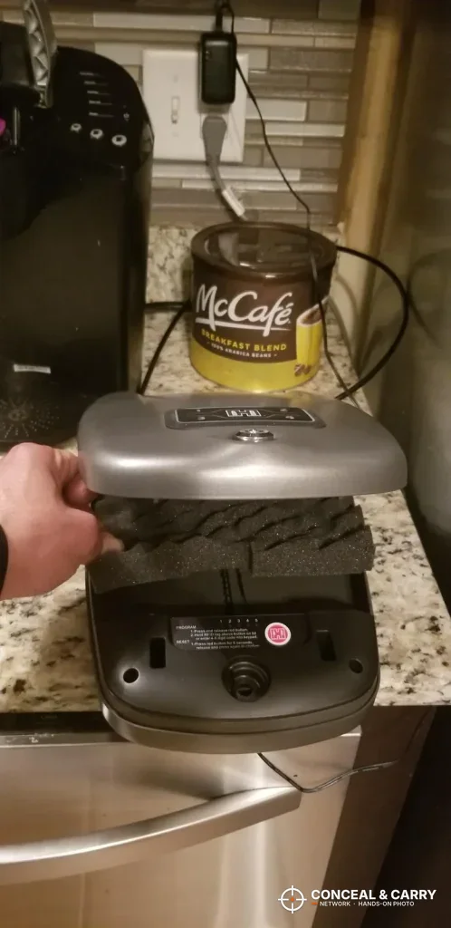 Hornady RAPiD Safe RFID lid raised on a kitchen counter