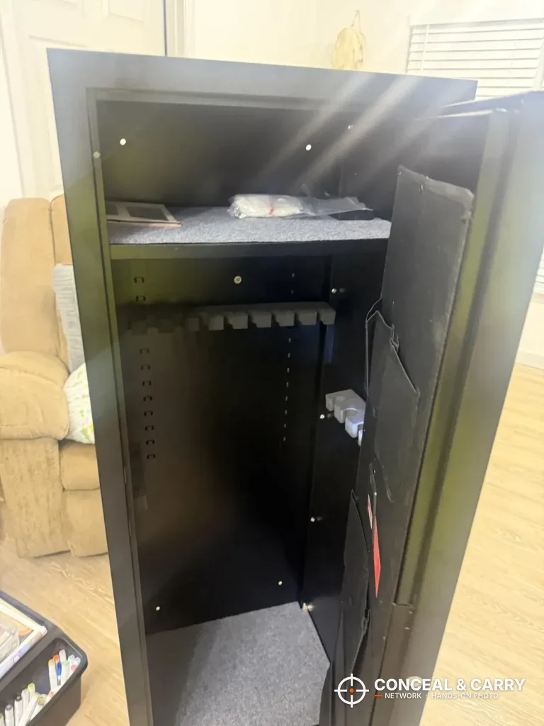 INTERGREAT gun cabinet door open with a top shelf, notched rack and door pockets