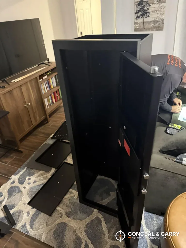 KAER 13-16 gun safe with interior panels laid on the rug during setup