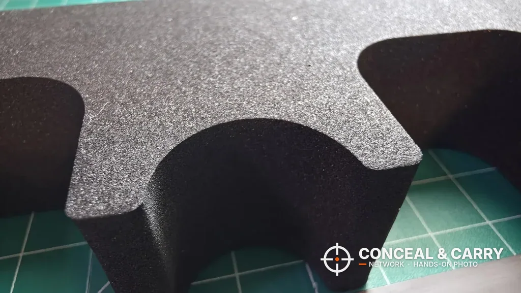 Close-up of a cutout in the KAER 18-21 gun safe foam rack