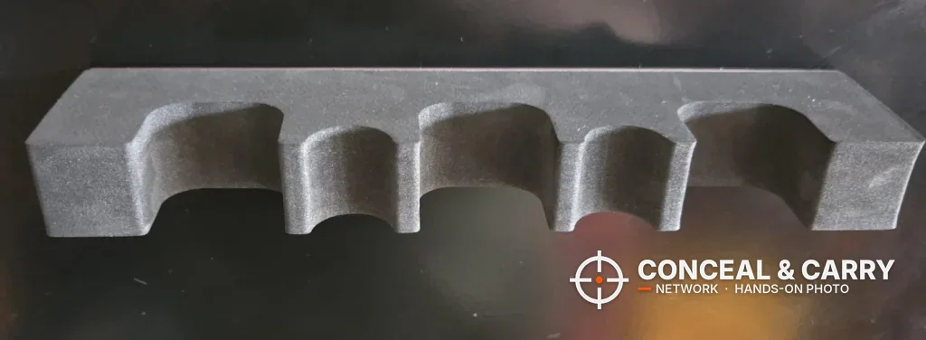 Gray foam rifle rack from the KAER 18-21 gun safe with its row of cutouts