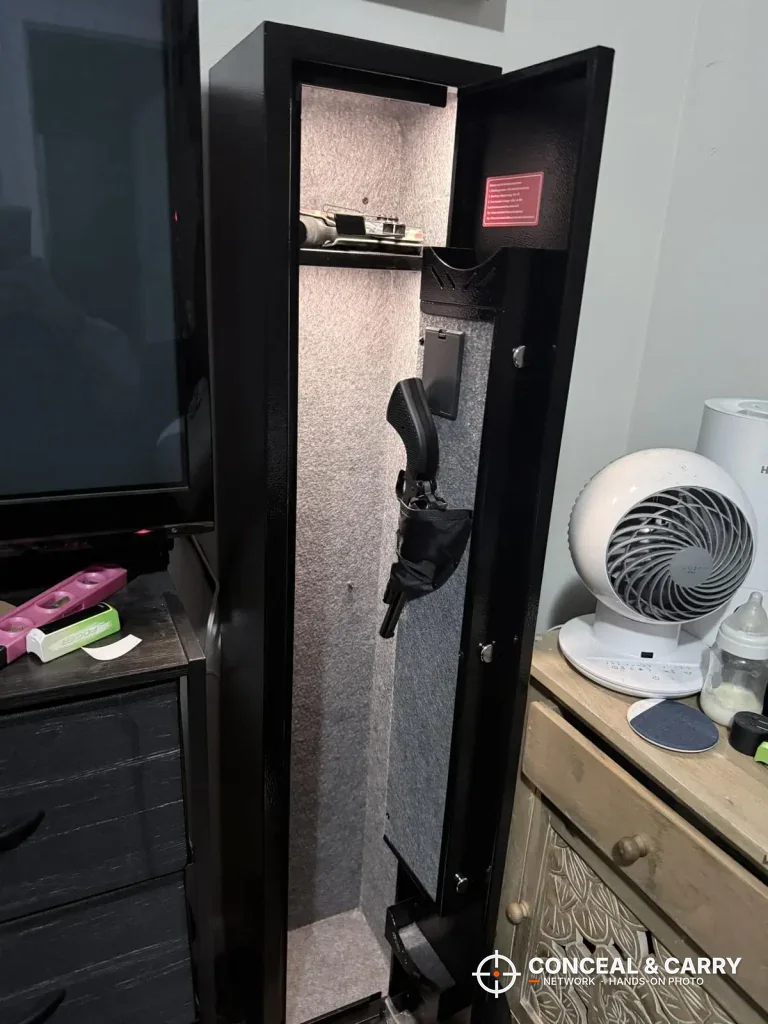 KAER 2-3 gun rifle safe standing open next to a dresser