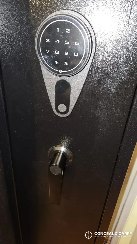 KAER 3-gun rifle safe keypad on its teardrop plate with the handle below
