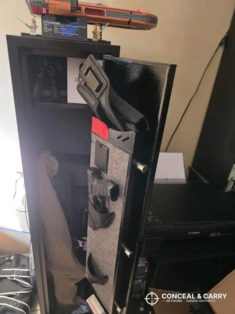 KAER 4-5 gun biometric rifle safe door open with gear in the door pockets