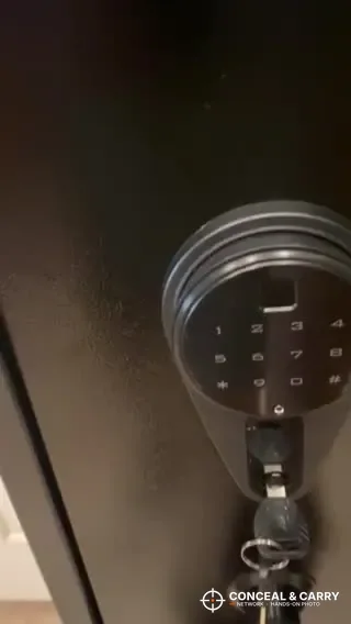 Keys hanging in the lock below the keypad on the KAER 4-5 gun safe