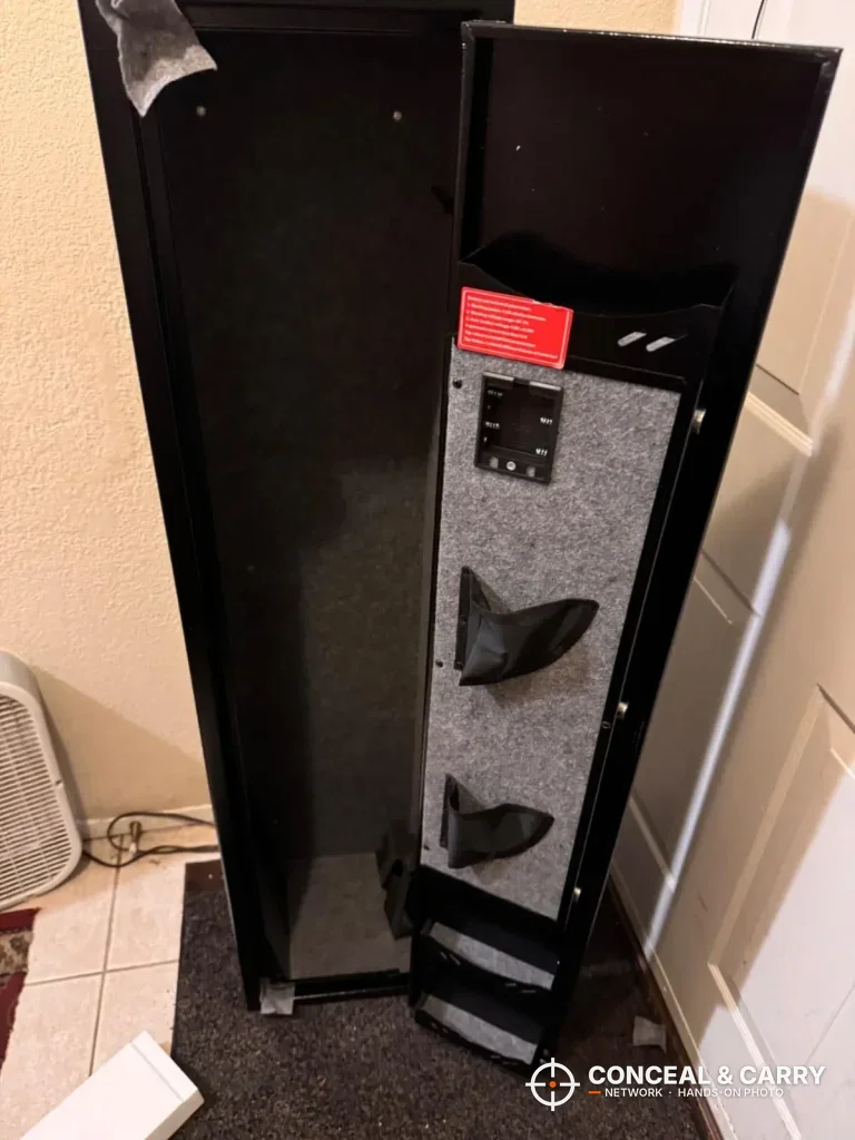 KAER 4-5 gun biometric rifle safe open with the felt-lined door and pistol pockets