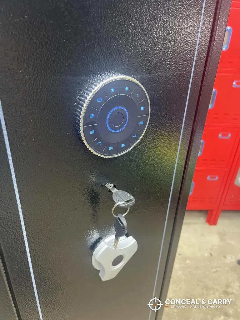 KAER 5-6 gun quick access safe keypad lit blue with a key in the lock