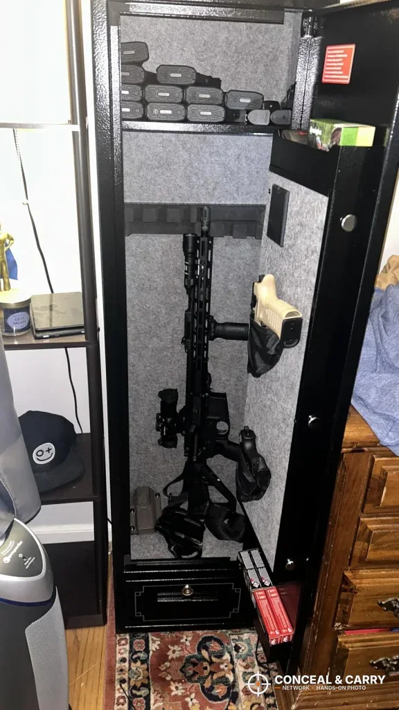 AR-style rifle with an optic standing in the KAER 5-6 gun quick access safe
