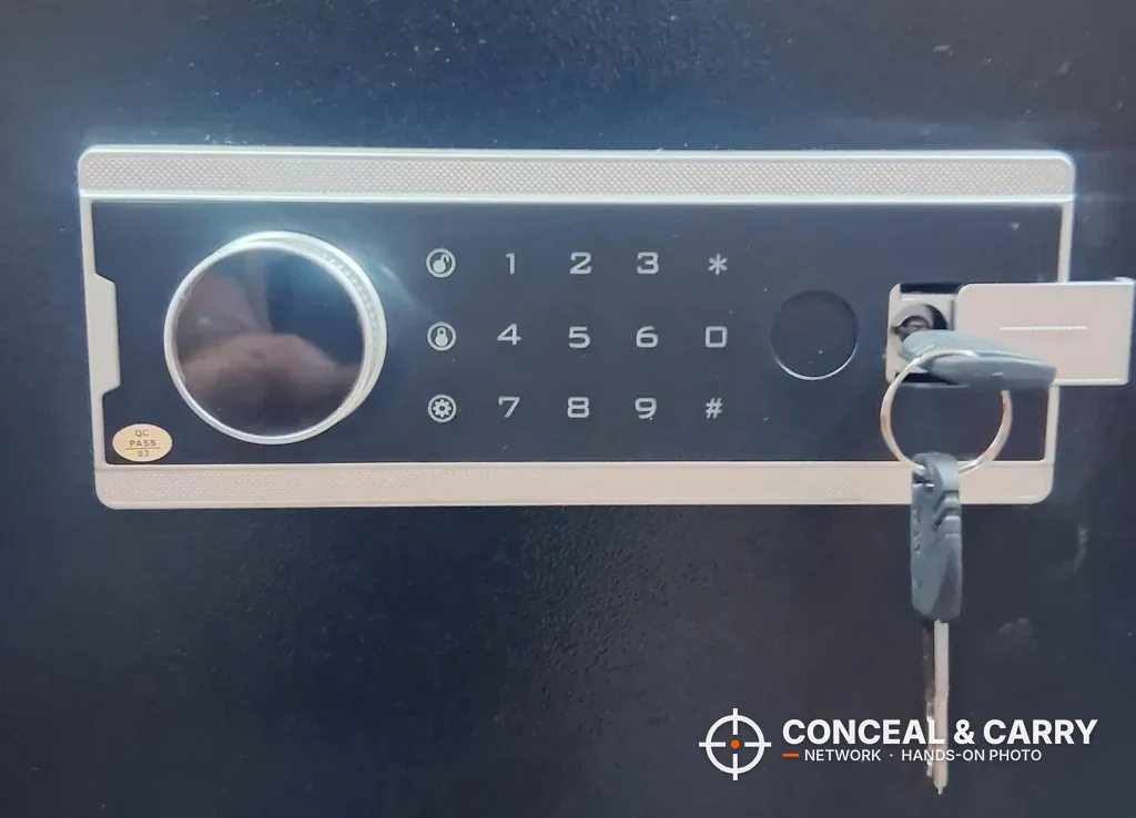 Close-up of the KAER 8-12 keypad panel with a key in the lock