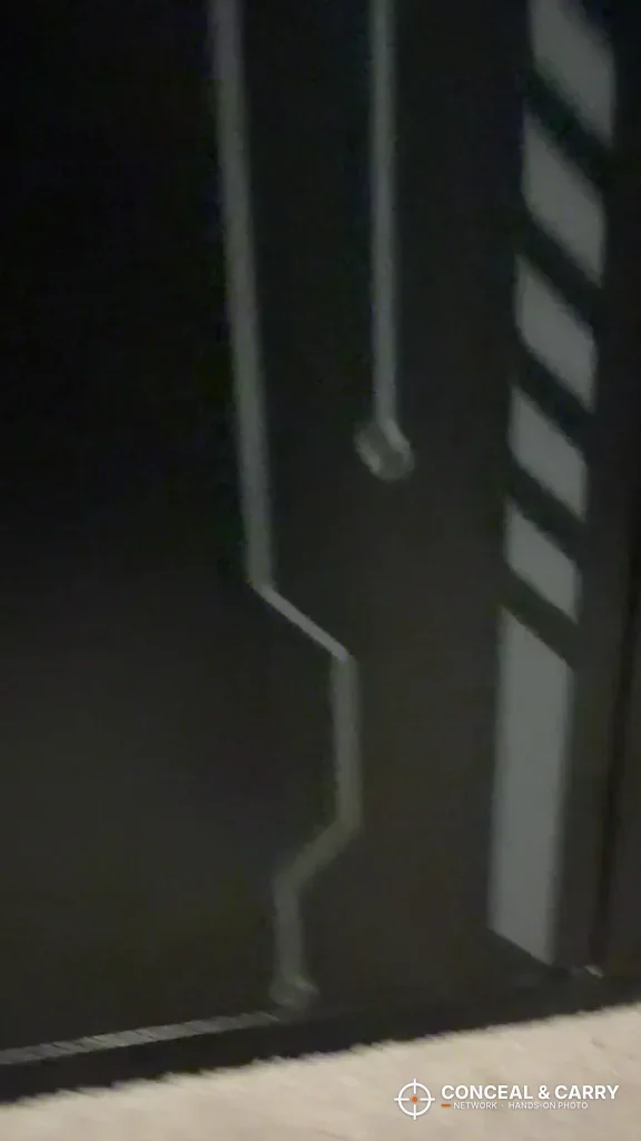 Gray line graphics on the front of the KAER 8-12 cabinet