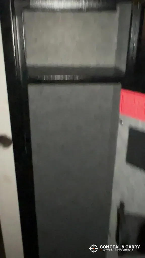 Close-up of the gray lining and shelf edge inside the KAER long gun safe