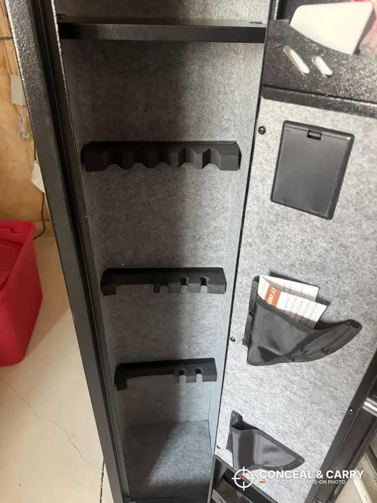 KAER long gun safe door organizer pockets beside the notched racks
