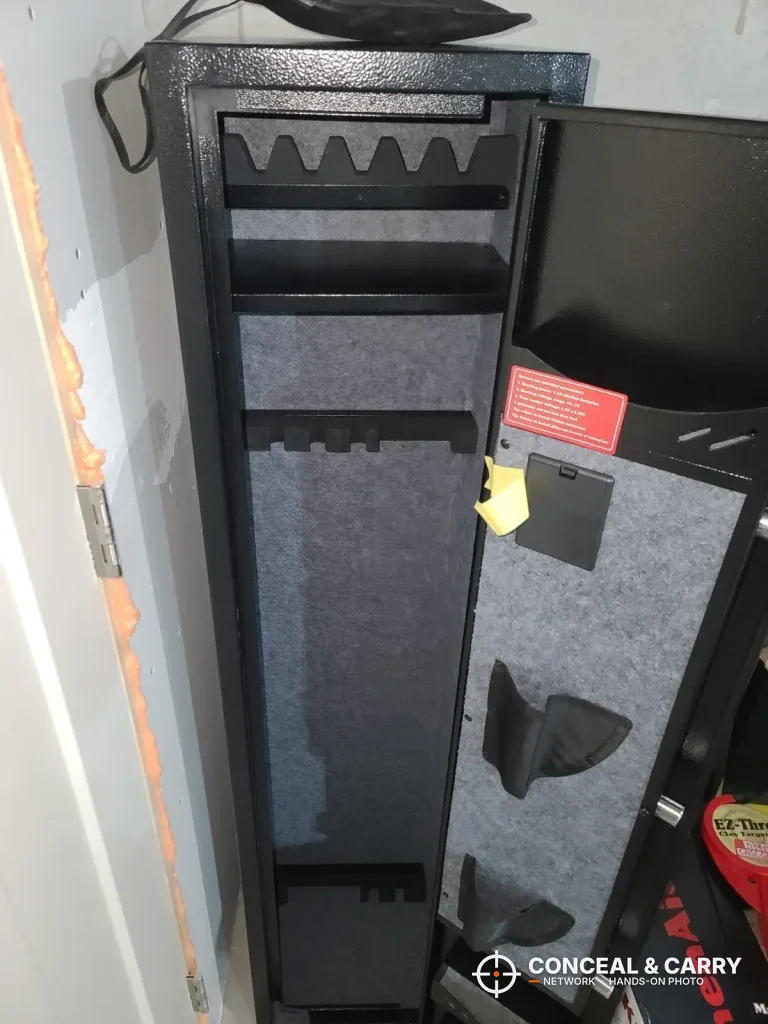KAER long gun safe interior with a notched rack near the top and the door open